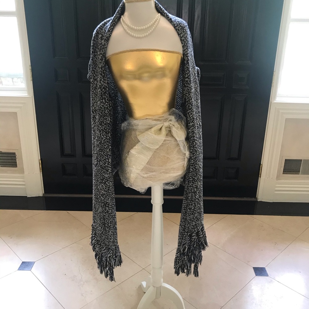 Cape with sleeves